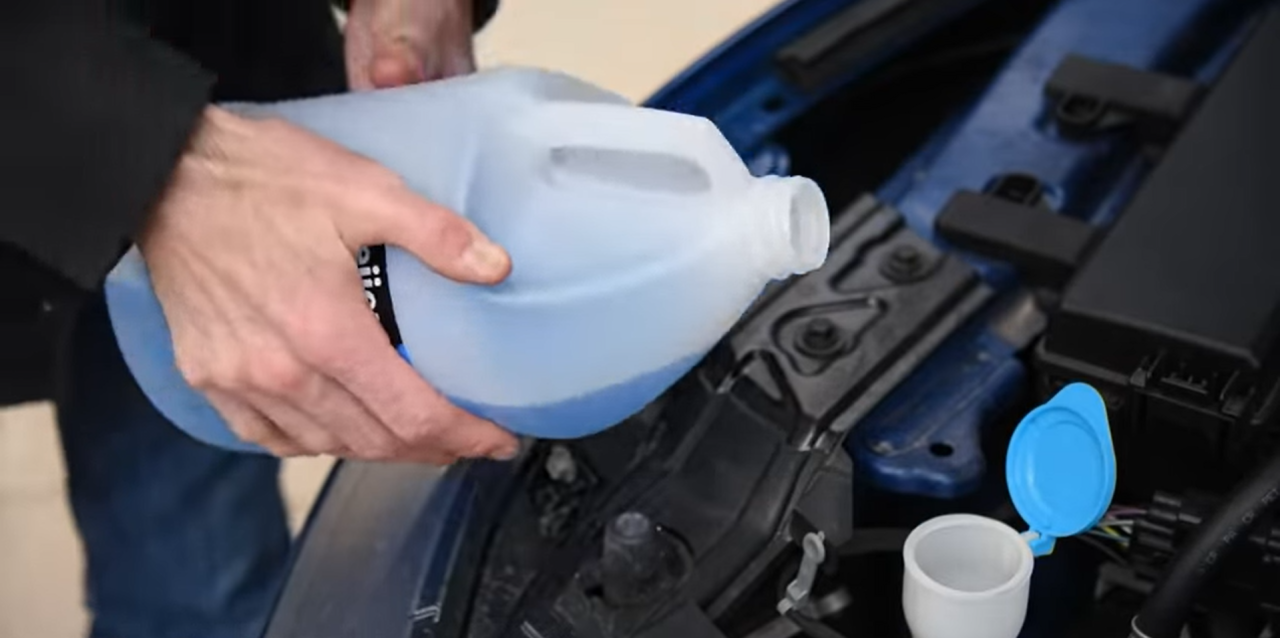 pouring-coolant-in-car-1